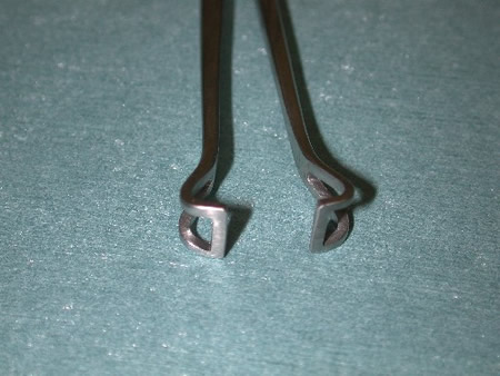 distal end- Babcock tissue forceps